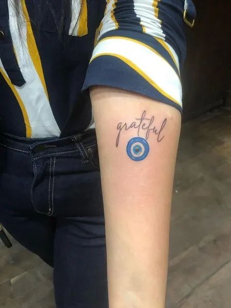 Script grateful with eye tattoo design for women on forearm tattoo ideas