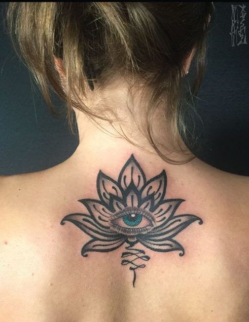 Black and Grey lotus and eye tattoo design for women on back tattoo ideas