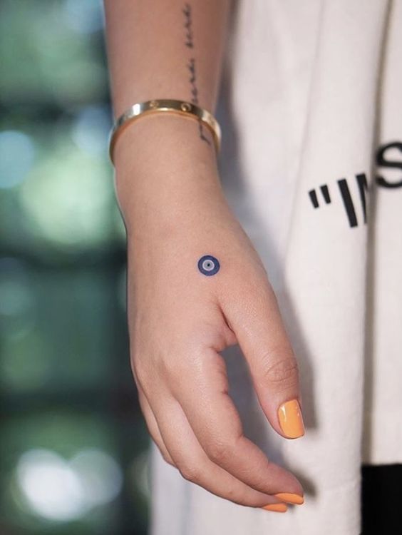 Fine Line eye tattoo design for women on hand and arm tattoo ideas