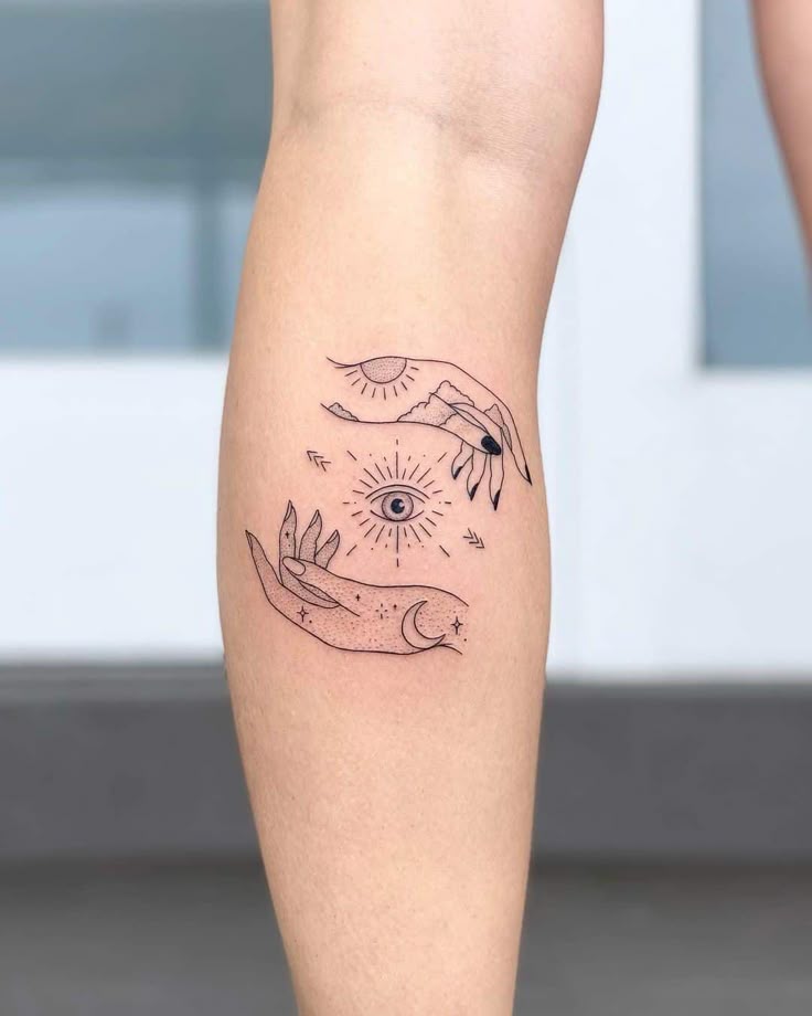 Minimalist sun, moon, and eye tattoo design for women on leg tattoo ideas