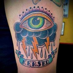 Traditional eye and cloud with lightning tattoo design for men on thigh tattoo ideas