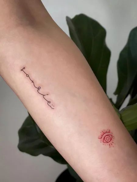 Minimalist quote and eye tattoo design for women on forearm tattoo ideas