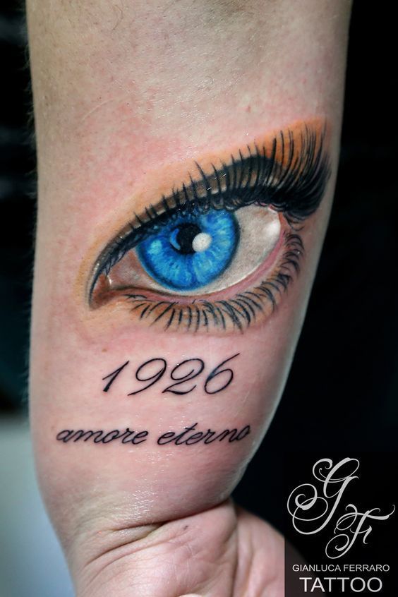 Realistic eye and quotes tattoo design for ladies in realism style tattoo ideas