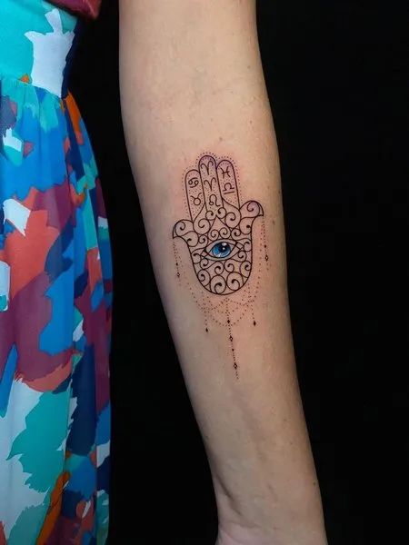 Fine Line evil eye and zodiac signs tattoo design for women on forearm tattoo ideas