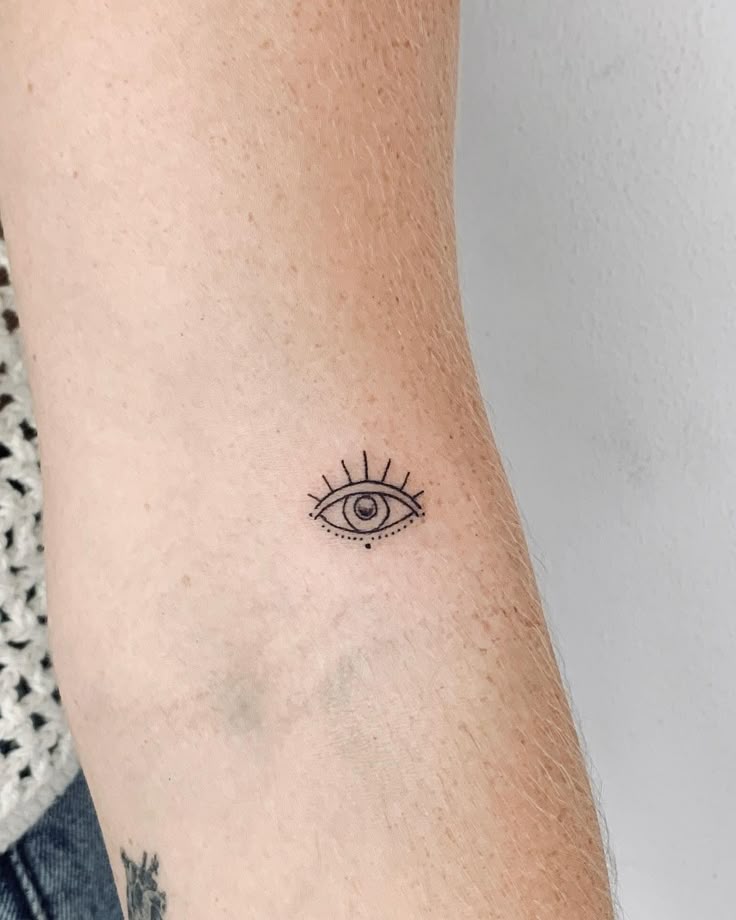 Fine line eye tattoo design for women on arm tattoo ideas